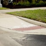 Curb cut in a sidewalk