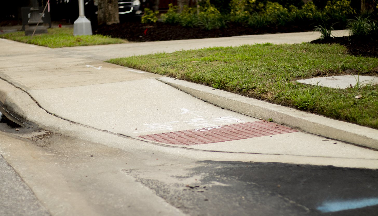 Making curb cuts in sidewalks and entrances Equal Access Construction